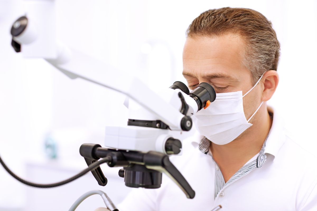 Treatment under a microscope